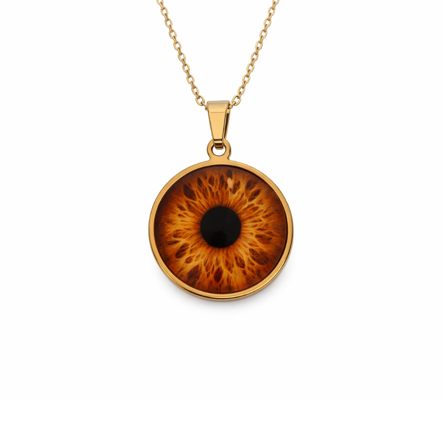 Gold necklace with an eye-shaped pendant on a white background