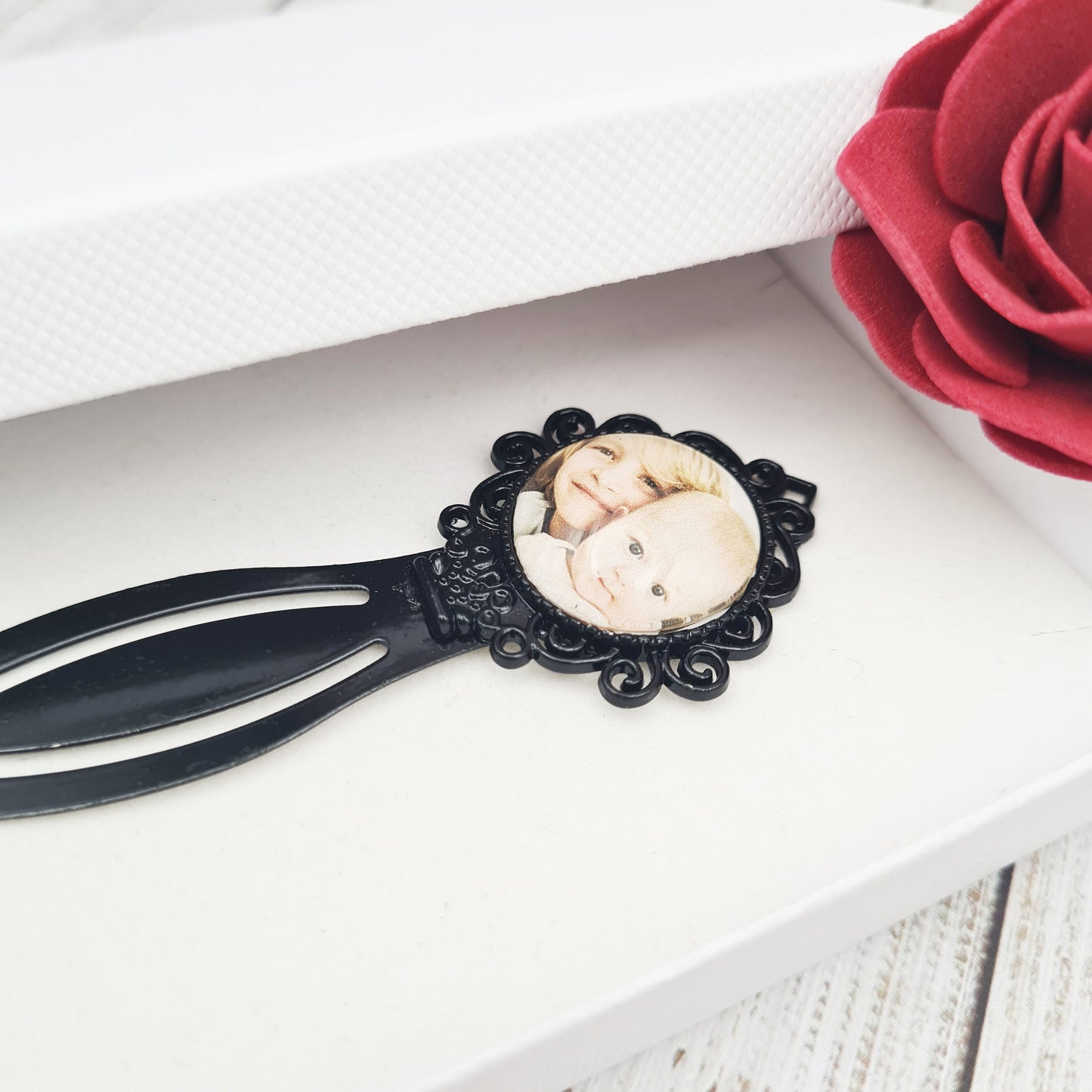 Black bookmark with personalised photo in glass inside a box