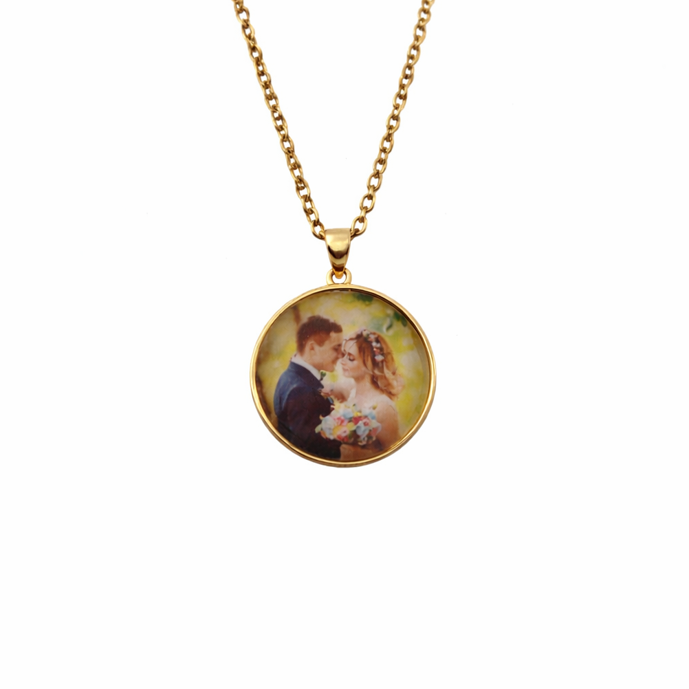 Necklace with a pendant featuring an image of a couple on a white background