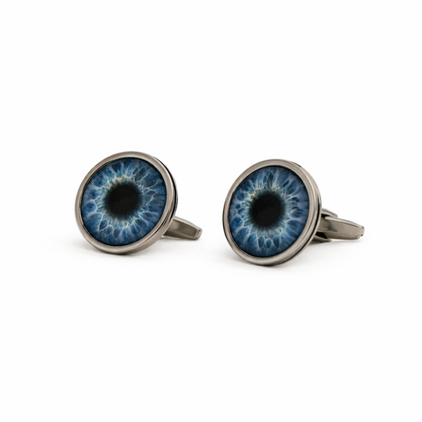 Pair of blue eye-shaped cufflinks on a white background