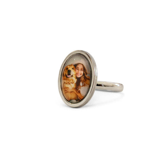 Ring with a circular design featuring a portrait on a white background