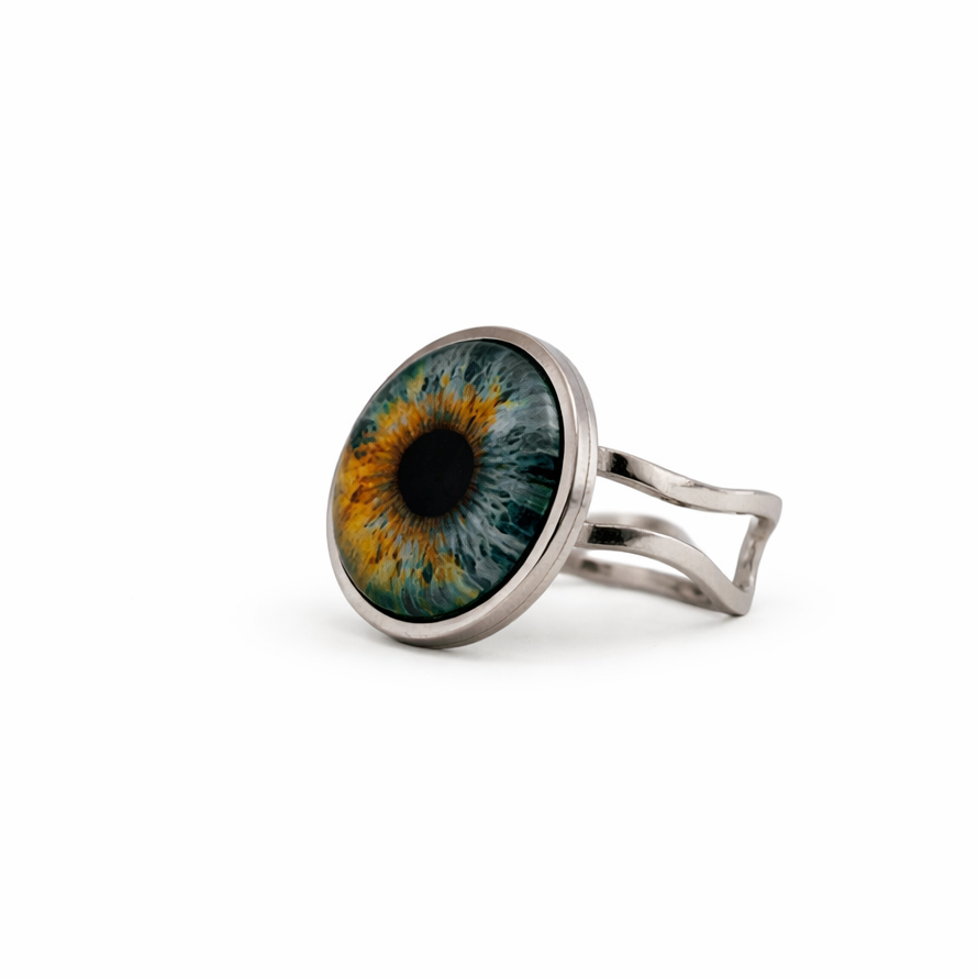 Ring with a colorful eye design on a white background
