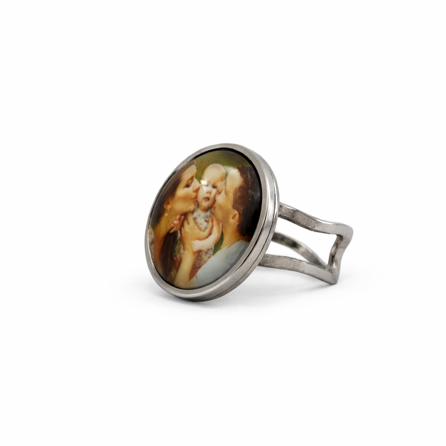 Ring with a portrait of a woman on a white background