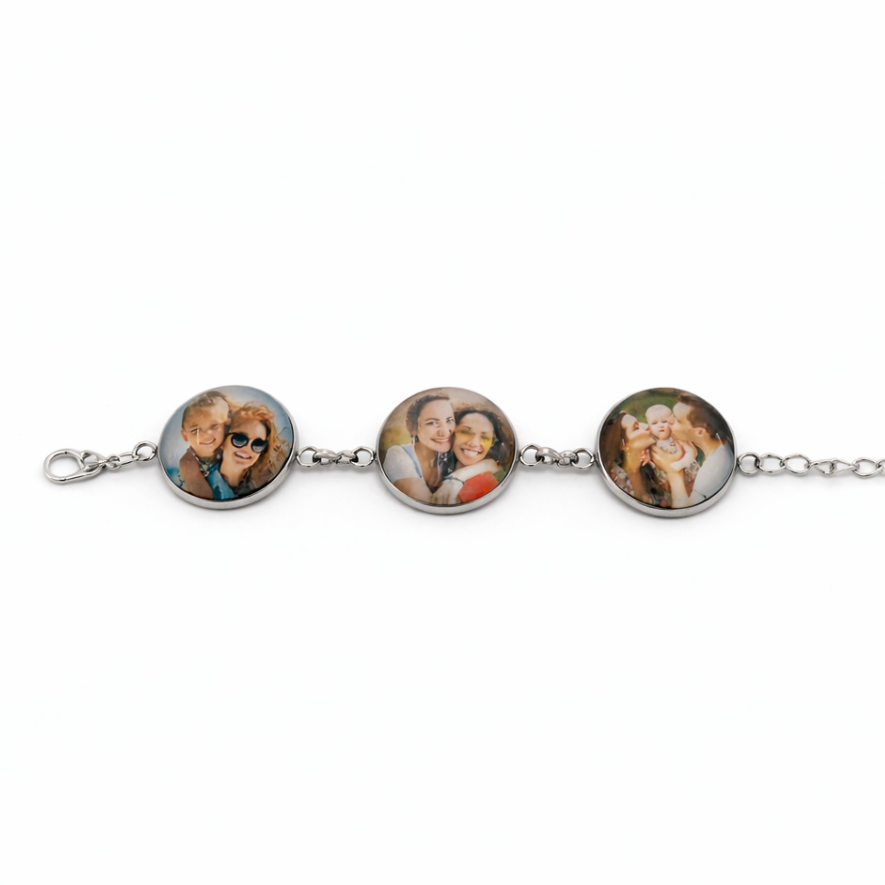 Bracelet with three round charm images on a white background