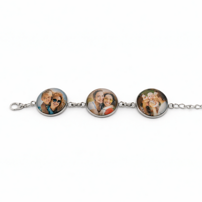 Bracelet with three round charm images on a white background