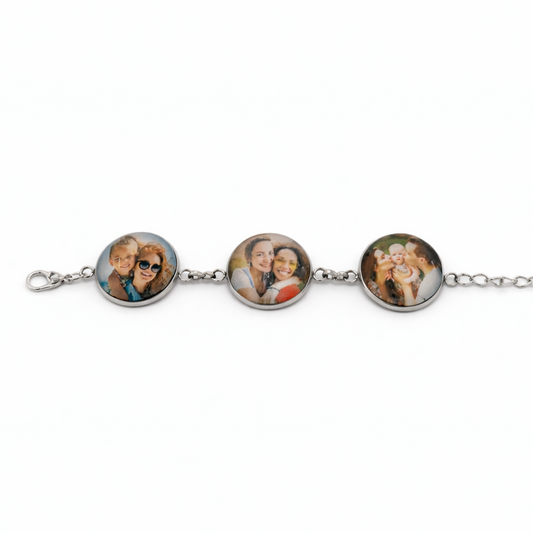 Bracelet with three round charm images on a white background