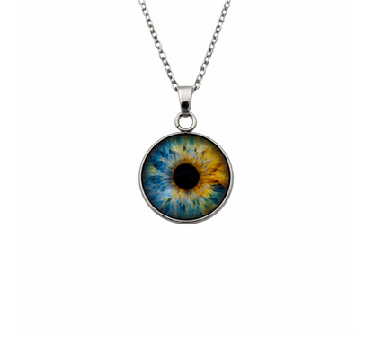Necklace with a round pendant featuring an eye design on a white background