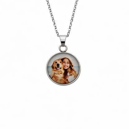 Necklace with a round pendant featuring a photo of a woman and a dog on a white background