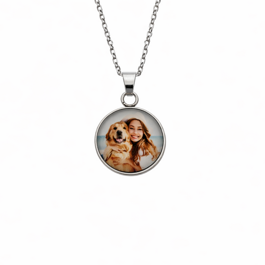 Necklace with a round pendant featuring a photo of a woman and a dog on a white background