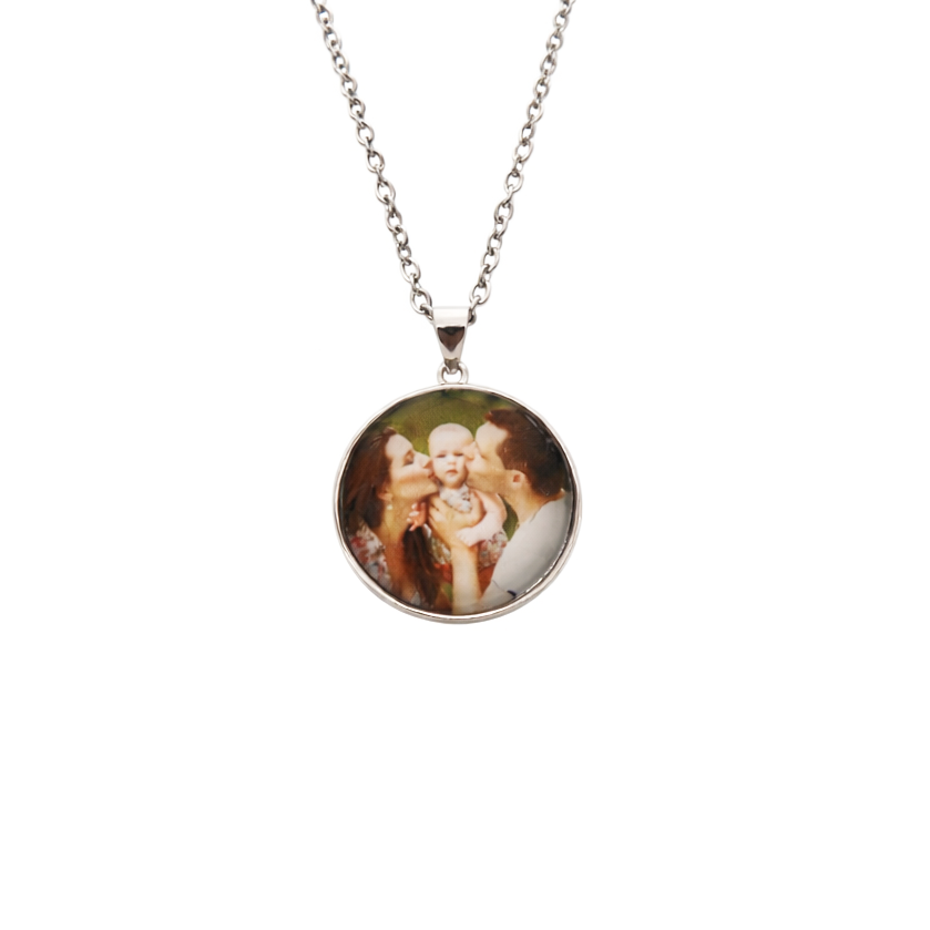 Necklace with a round pendant featuring an image of a couple on a white background